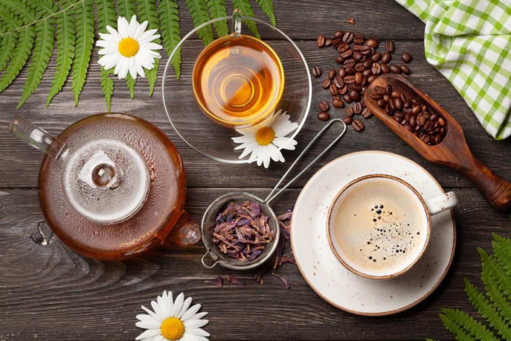 Coffee and tea on table as example of foods that stain your teeth.