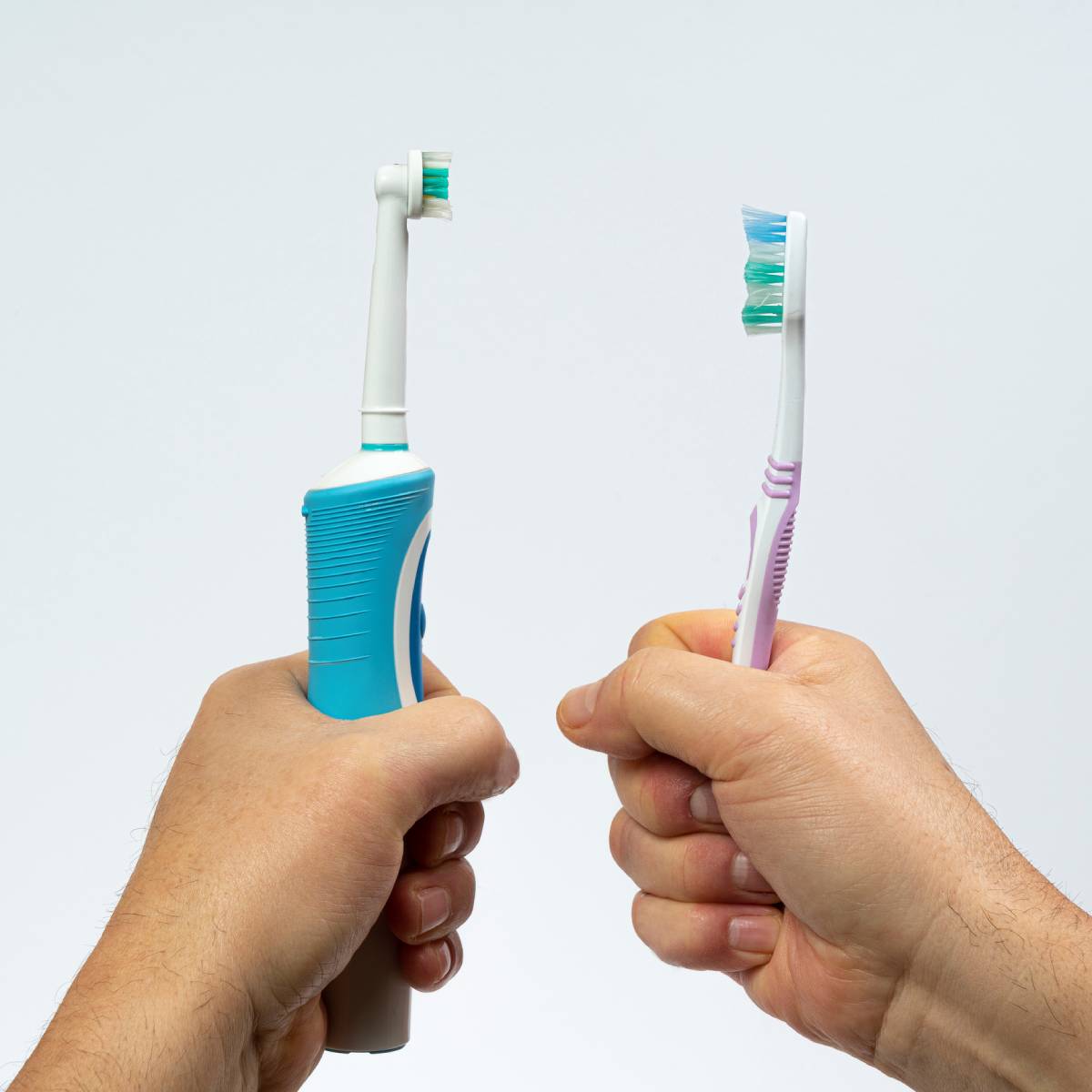 the contrast of an electric toothbrush with a traditional one